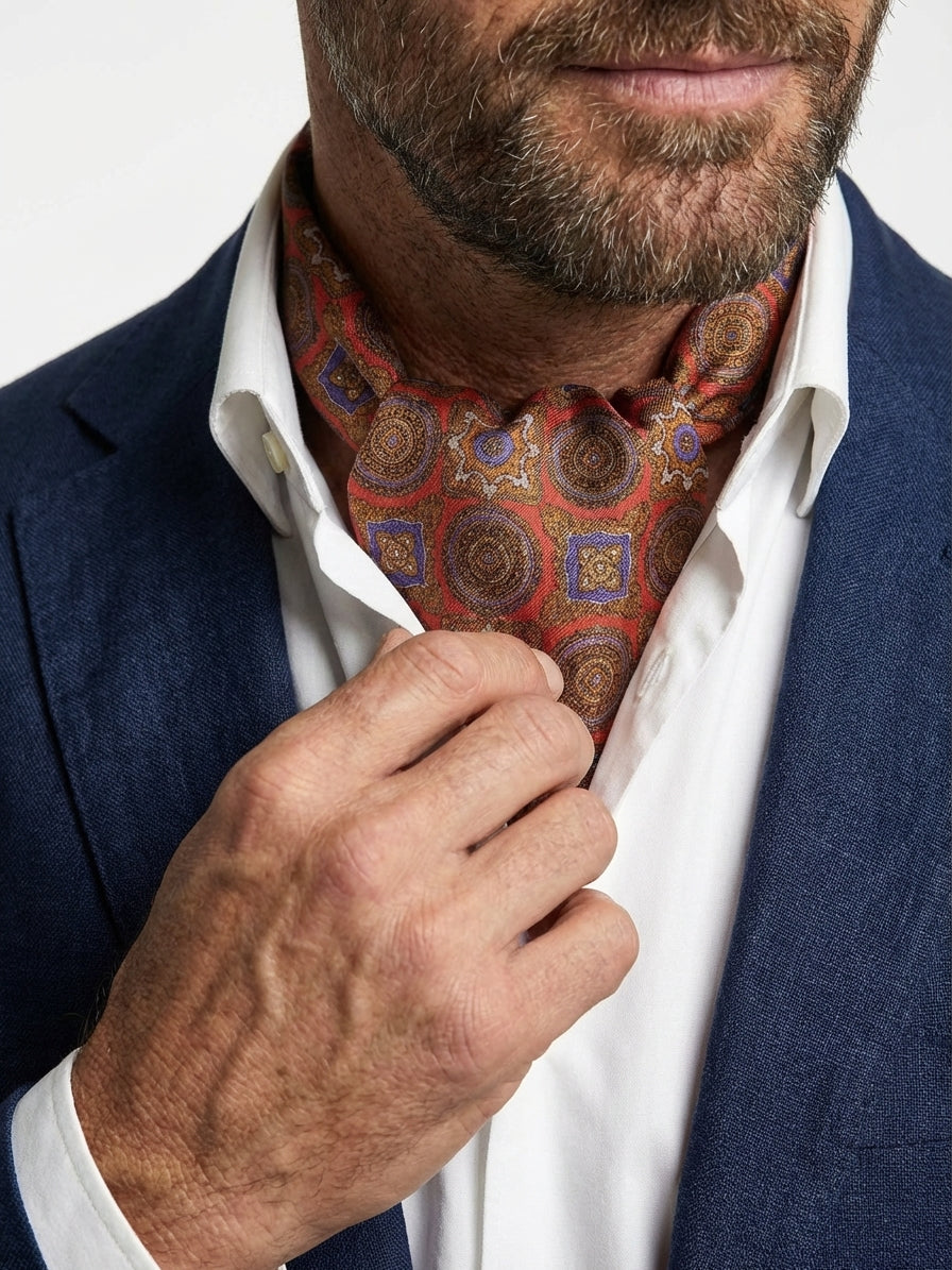 Ascot doppia punta arancione in seta raso stampata BOTTON