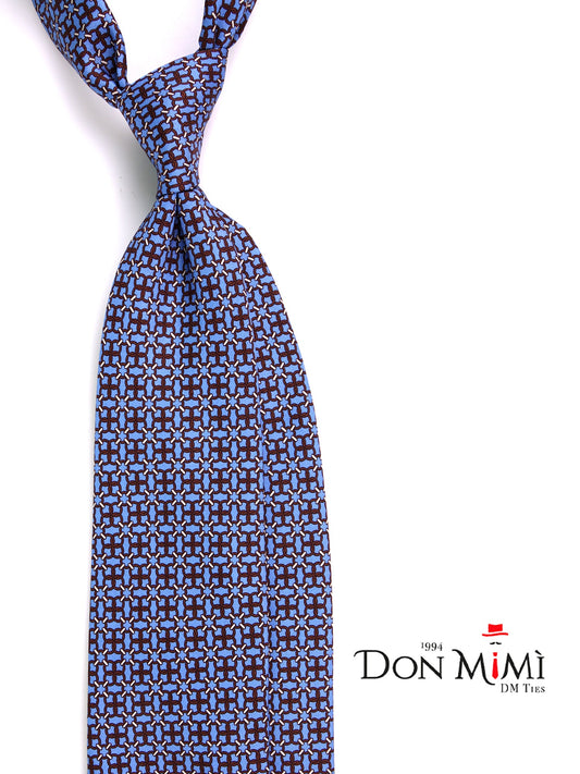 Light blue 3 fold CHARI tie in printed silk